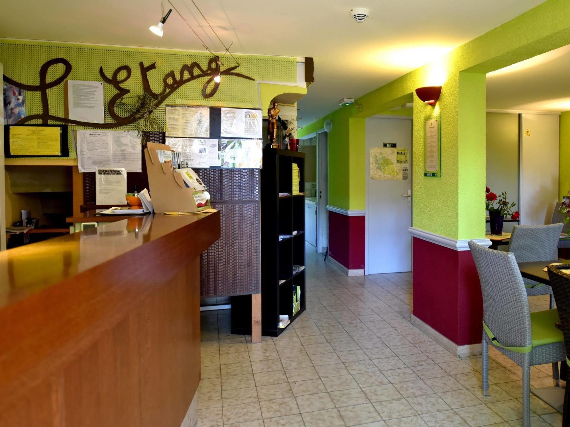 Logis Hotel De L'Etang Кюкюрон Экстерьер фото
